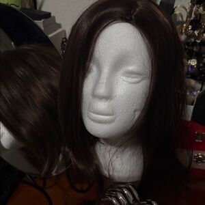 Woman’s Light Brown long hair wig.